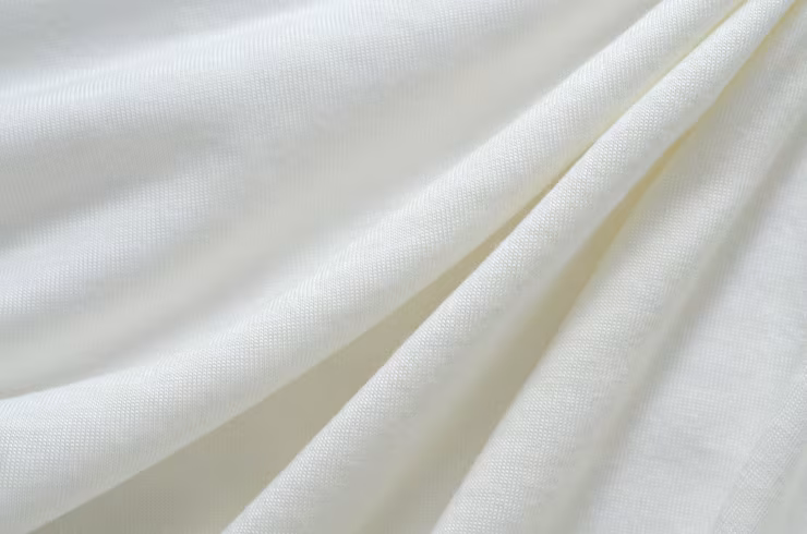 natural-white-cotton-crumpled-soft-fabric-texture-background-surface_640221-220